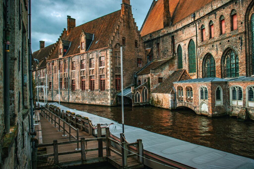 Brick Gothic Buildings by the Canal in Bruges Belgium