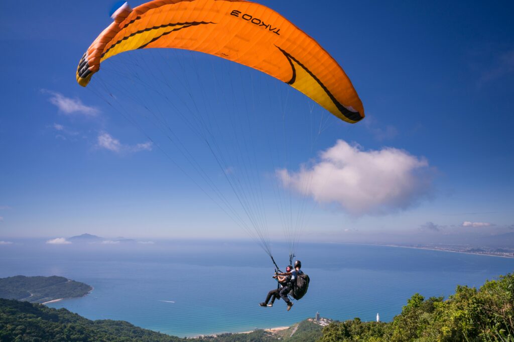 Person Riding on Parachute